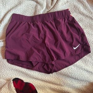 Nike court flex shorts with pockets and spandex liner